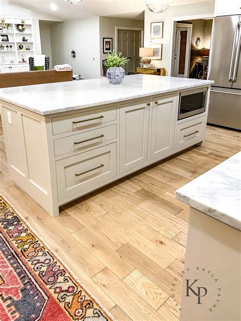 The counter top is holding out well.5. Carrara Marble Countertops, marble countertop island ...