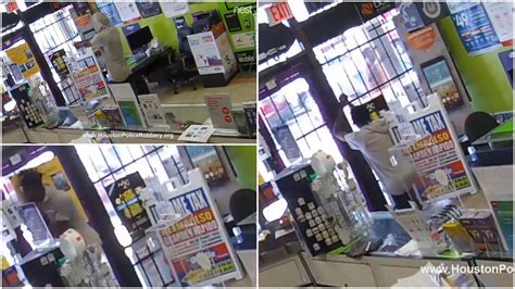 Armed Robber Filmed On His Knees Begging To Escape After Brave Shop Worker Locks Him Inside