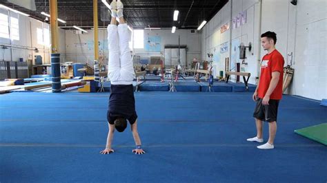 How To Do A Handstand Press Howcast