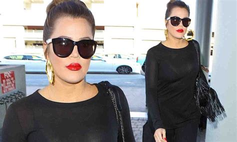 Khloe Kardashian Looks Sexy In Sheer Black Top As She Jets Off To Dubai