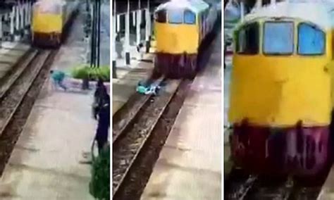 Video Shows Man Run Over By Train Before Walking Away Daily Mail Online