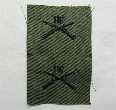 Pair Of 116th Infantry Regiment Collar Insignia Griffin Militaria