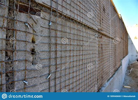 Strengthening Of Concrete Block Masonry Walls Using Steel Wire Mesh