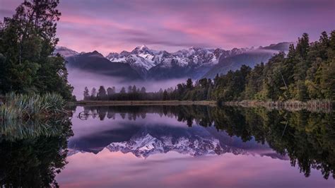1366x768 Mountain Reflection Over Lake In Dawn 1366x768 Resolution