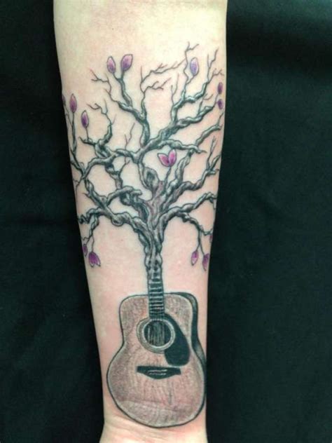 On one hand, it can be a representation of your passion, your chance at redemption in this world, and your life. Guitar tree tattoo | Tree tattoo, Tattoos, Neck tattoo