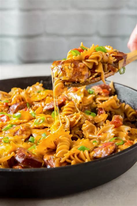 Short penne pasta with thinly sliced. On Pan Cheesy Smoked Sausage Pasta Skillet | Recipe ...