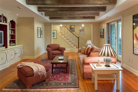 Original Exposed Wood Beams Adds To The Warm And Inviting Atmosphere In