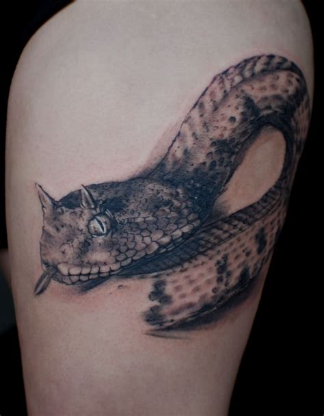 Back then, throwing a snake eyes (a pip on each die) was known as a dog's throw and can symbolize good or evil depending on the context of the situation. Pretty snake tattoo (4) - snake leg tattoo on TattooChief ...