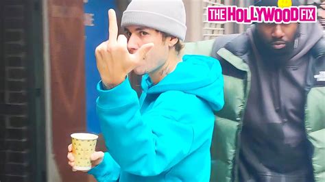 Justin Bieber Gives Paparazzi The Middle Finger While Pulling Up To The Studio With Hailey In N