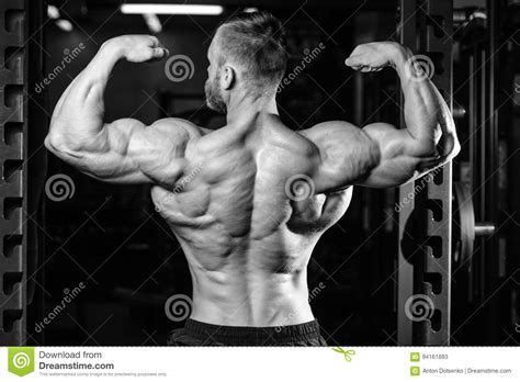 Handsome Power Athletic Man Diet Training Pumping Up Back Muscle Stock