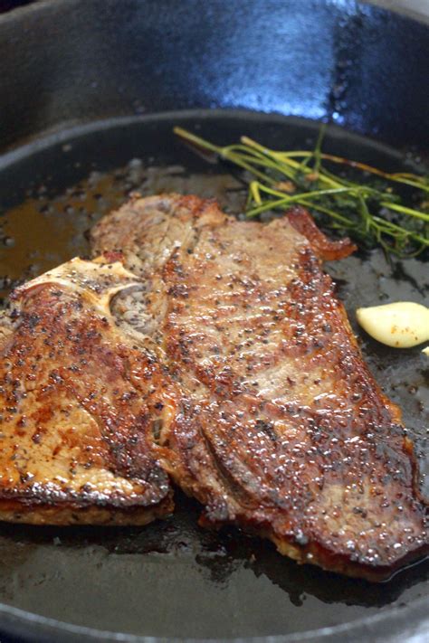 Your ribeye will be seared to perfection whether you add some garlic cloves, herbs like rosemary and thyme, or not!! Pan Seared T-bone Steak | Recipe | Cooking t bone steak, T ...