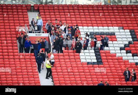 Manchester United Fans Evacuated From Old Trafford By Security Police And Stewards After The