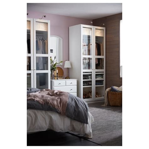 Ikea pax wardrobe is a simple and cool piece for your clothes and shoes though you may say that it looks too usual. PAX Wardrobe - white, Tyssedal glass - IKEA