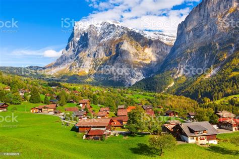 Grindelwald Switzerland Village And Mountains View Stock Photo