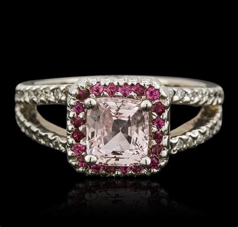Please phone a diamond and jewelry expert and they will help you complete your perfect ring. 14KT White Gold 1.84ct Pink Sapphire, Ruby and Diamond Ring