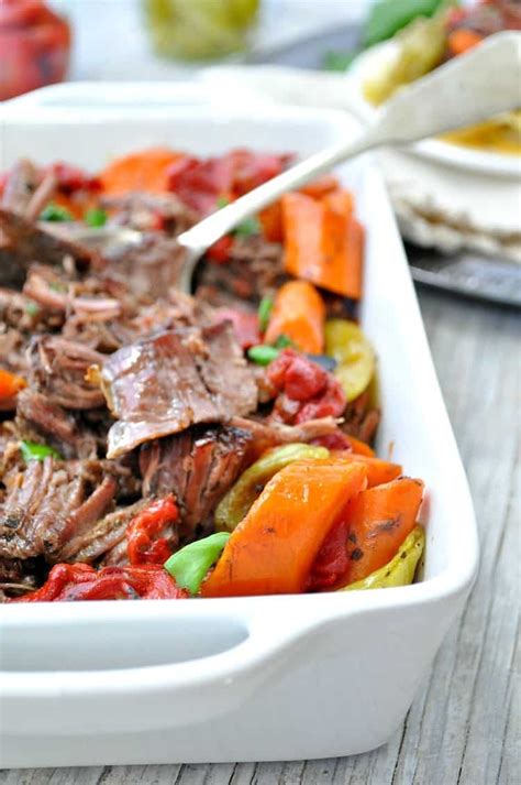 Italian pot roast made tuscan style, simmering for hours in a delicious tomato sauce to ensure cold weather calls for comfort food, like this hearty and cozy italian pot roast. Slow Cooker Italian Pot Roast - The Seasoned Mom