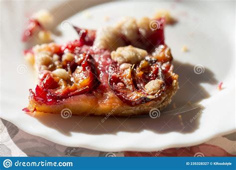 Cake With Plums And Crumble On Plate Sunny Day Stock Image Image Of