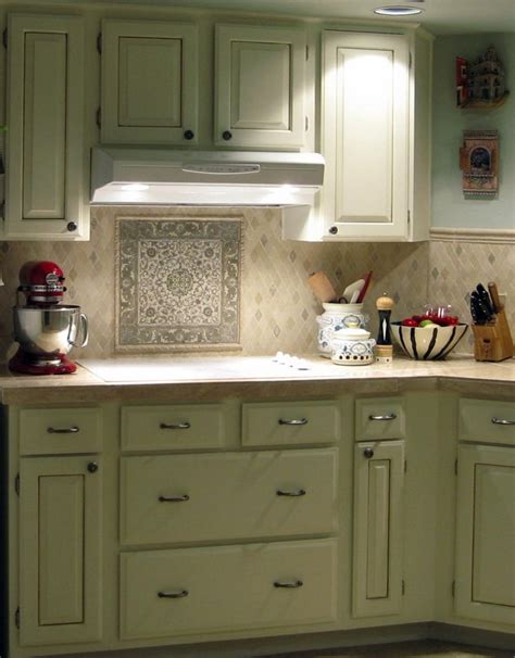 Mix and matched reclaimed tile backsplash. Backsplash tile, Tile design and Vintage kitchen on Pinterest