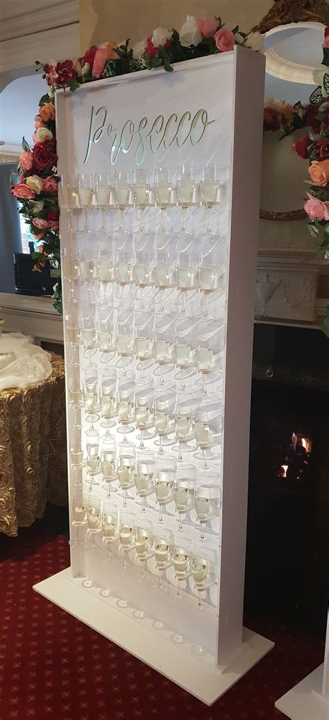 Provides security, shelter, or soundproofing; Prosecco Wall by Carolyn's Sweets - Present your Prosecco ...