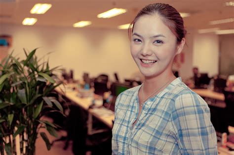 Filechinese Model With A Bright Smile In Office Environment
