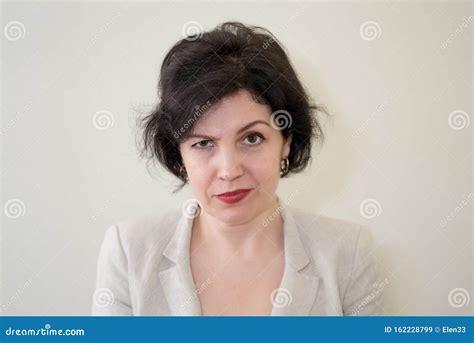 Headshot Of Displeased Caucasian Woman Being Upset Raising Her Eyebrows