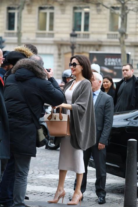 ANGELINA JOLIE Arrives At Guerlain Perfumes Shop On Champs Elysees In