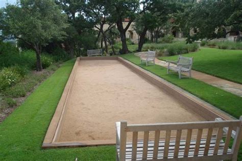 The small rock particles lock into place once compacted, creating a strong surface for walking and bocce balls. How to Build a Bocce Ball Court | Bocce ball court ...