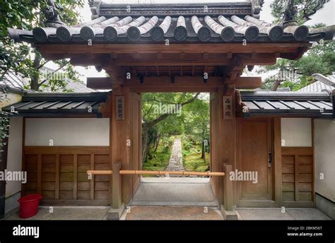 Traditional Japanese Wooden Gate To The Garden Of Ryoan Ji Temple