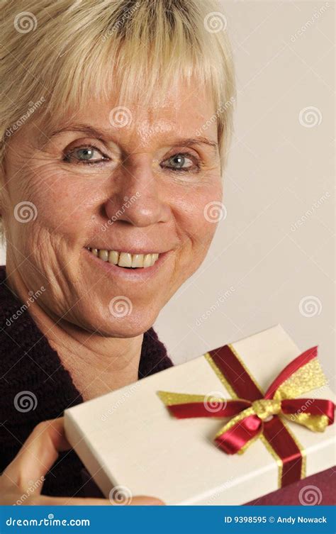 Mature Woman With Present Stock Image Image Of Details 9398595