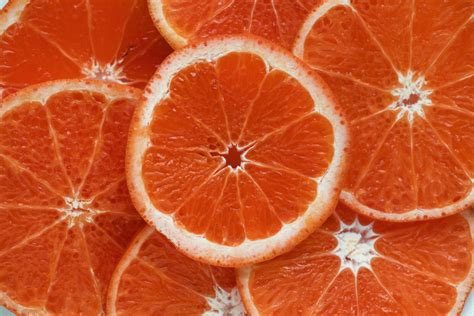Close Up Photograph Of Slices Orange Citrus Fruits Goldposter Free