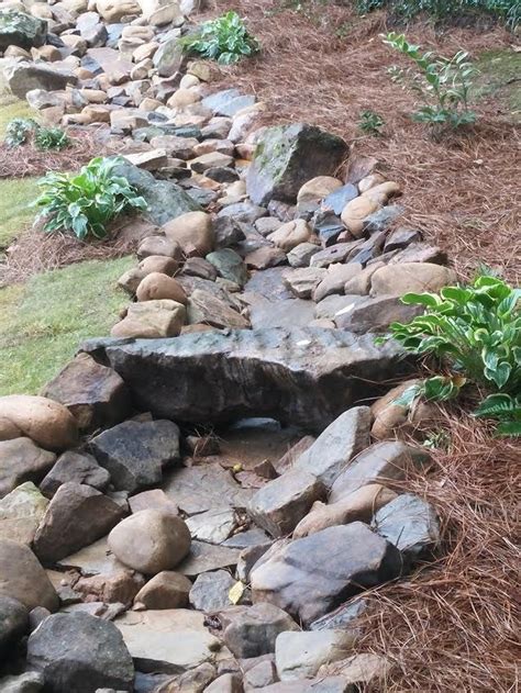Pin By Tracy Hiatt On Crushed Brick River Rock Landscaping