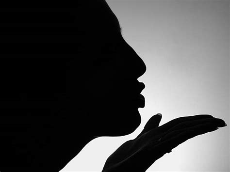 Woman Blowing Kiss Silhouettes Stock Photos Pictures And Royalty Free