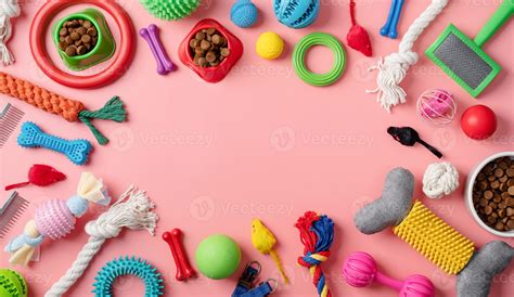 Pet care concept, various pet accessories and tools on pink background