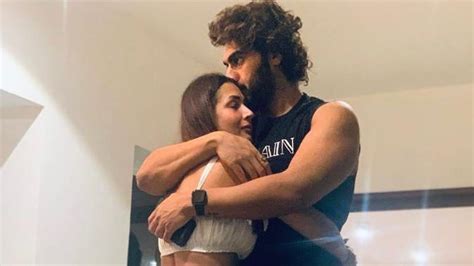 on valentine s day malaika arora gives tight hug to arjun kapoor as he kisses her on forehead pic