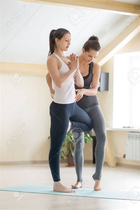Young Beautiful Fit Lady Beginning Yoga Practice With Private Teacher At Home Or Class Working