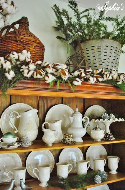 I have lived in older homes where there is a soffit so i decorate that. Love the cotton garland. | Christmas dining, Above cabinet decor, Christmas decorations