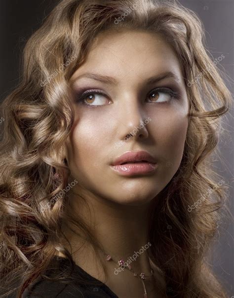 Beauty Portrait With Perfect Skin And Healthy Curly Hair Stock Photo