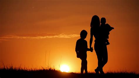 Mother Two Kids Silhouettes At Sunset Stock Footage Sbv 323643810