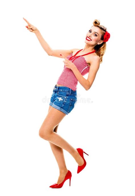 Full Body Woman Pointing At Something Excited Girl In Pin Up Showing Copy Space Isolated