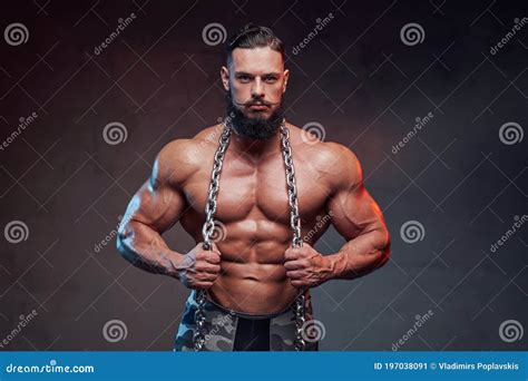 Bodybuilder With Beard Holding Steel Chains And Posing Stock Image Image Of Beard Human