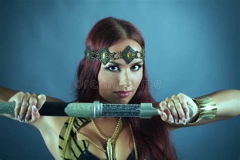 Warrior Woman Holding Sword In Her Hand Stock Photo Image Of Fight