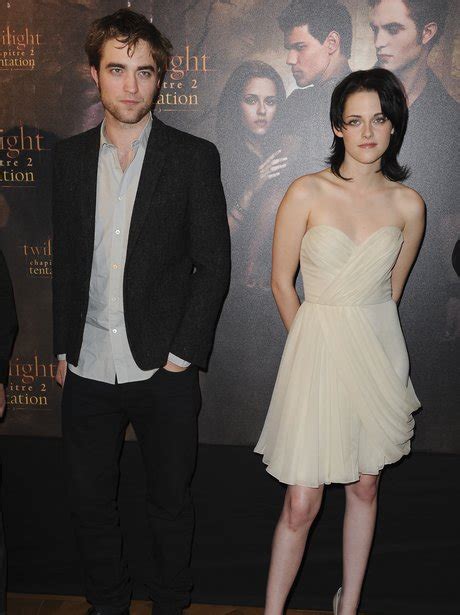 She cheated on him like a dog & will do it. Kristen Stewart and Robert Pattinson at the Twilight Saga ...