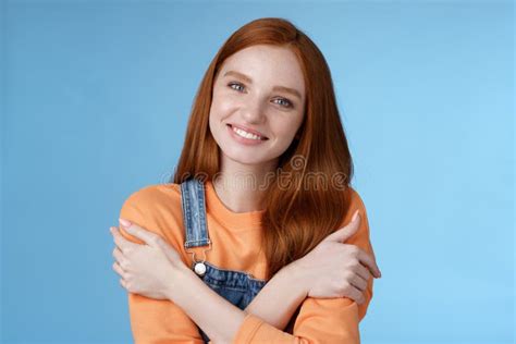 Tender Silly Redhead Girl Standing Blue Background Smiling Joyfully Hugging Arms Crossed Body