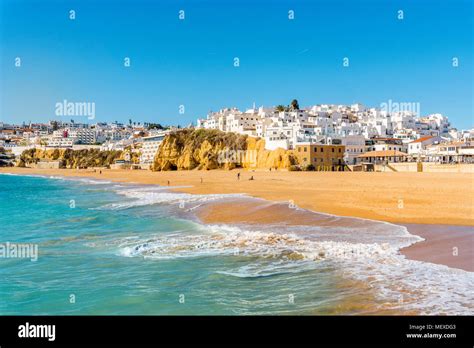Wide Sandy Beach In White City Of Albufeira By Atlantic Ocean Algarve
