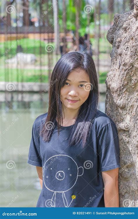 Shoot Asian Woman Portrait In Lifestyle At Public Park Stock Image