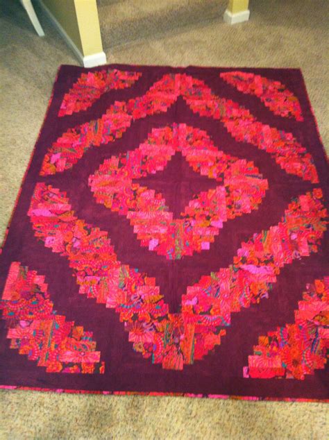 Curved log cabin quilt pattern. My curved log cabin - pattern by Blue Underground | Log ...