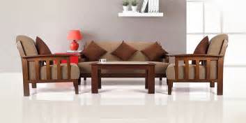 Latest wooden sofa design, the ones that embellish the living rooms with stylish and comfortable aura.it can transform any drab living space into the fab one. Latest Wooden Sofa Set Designs Best Models For Your Home Modern Sets India Living Room Layout ...