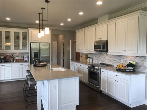 They sold us on refacing and now the surface more. Light cabinets & pendant lights | Sarasota real estate ...