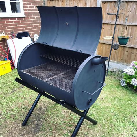 Heavy duty custom grill rack. Another oil drum barbecue sold! This one has 2 levels as ...