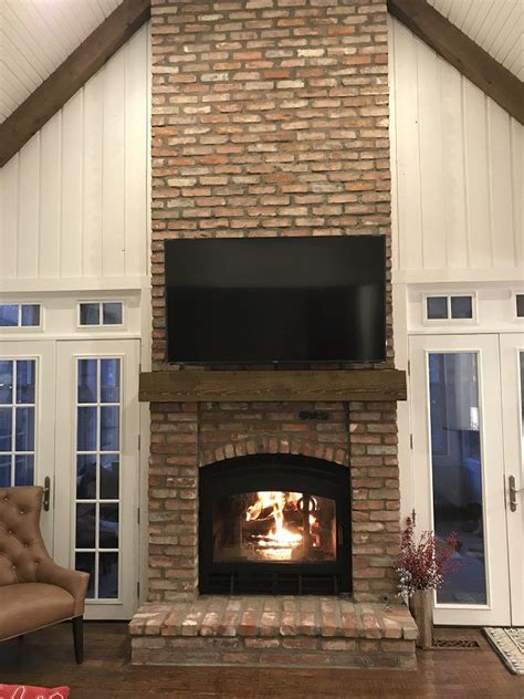 Is there an outdoor fireplace in a house? Indoor Outdoor Wood Fireplace Design Idea Gallery ...
